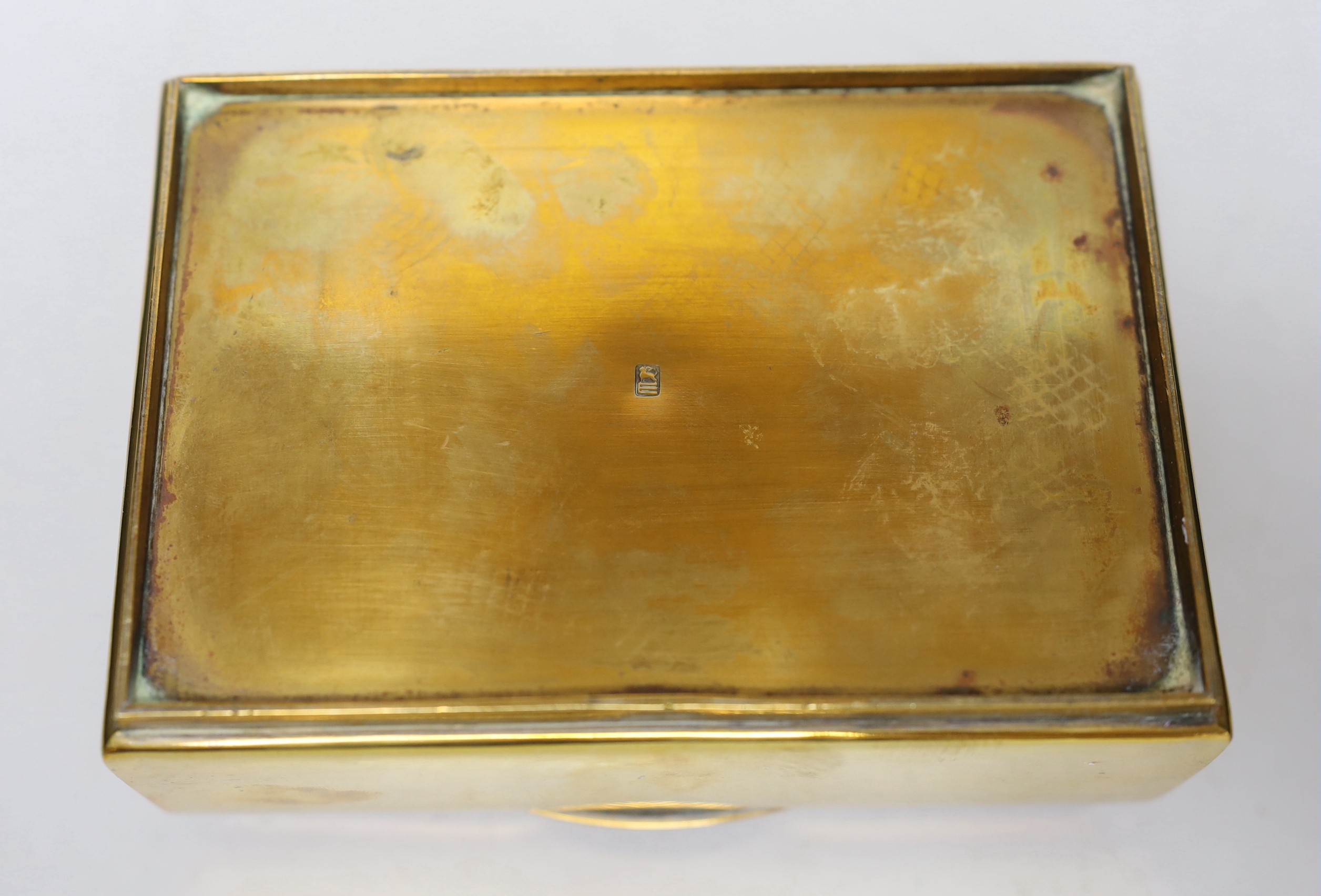 A burr oak topped brasswork cigarette box, 14cm wide, 10cm deep